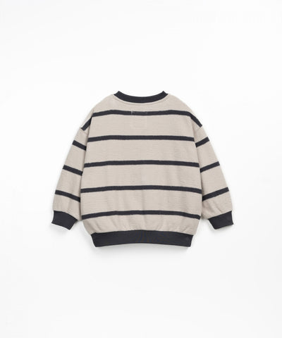 Striped knitted jumper with cuffs