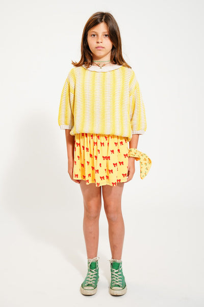 short skirt | yellow w/ red bows